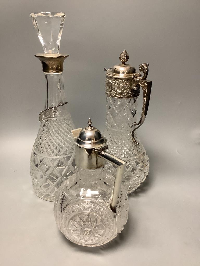 A late Victorian silver mounted cut glass claret jug, Chester, 1900, 21.6cm, together with a similar modern claret jug and decanter.